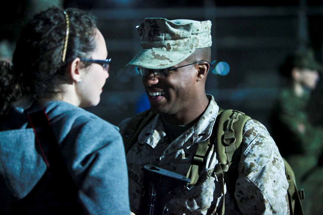 1st Lt. Jimmy Housley, a program manager with C-8, I Marine Expeditionary Force Forward, from Terre Haute, Ind., spends time with family and loved ones moments before departing Camp Pendleton, Calif., Jan. 13. Nearly 140 of the I MEF (Fwd) command element’s 300 Marines and Sailors said goodbye to family and friends as they departed for Camp Leatherneck and Camp Bastion in Afghanistan.