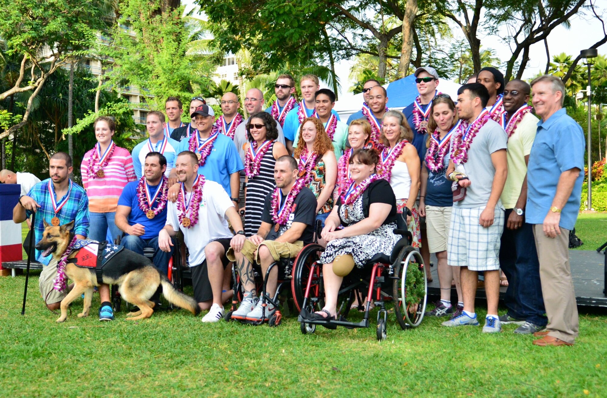 More than 120 wounded warriors, including the approximately 30 Air Force Wounded Warriors pictured here with Gen. Hawk Carlisle, Pacific Air Forces commander (far right) participated in the inaugural Wounded Warrior Pacific Invitational Jan. 5-11, 2014. The WWPI is an adaptive sports training camp preparing service members, who’ve fallen ill or were injured in the line of duty, for competition in the U.S. Olympic Committee's Warrior Games, held at the  U.S. Olympic Training Center and the U.S. Air Force Academy in Colorado Springs, Colo. (U.S. Air Force photo by Senior Airman Christopher Stoltz)