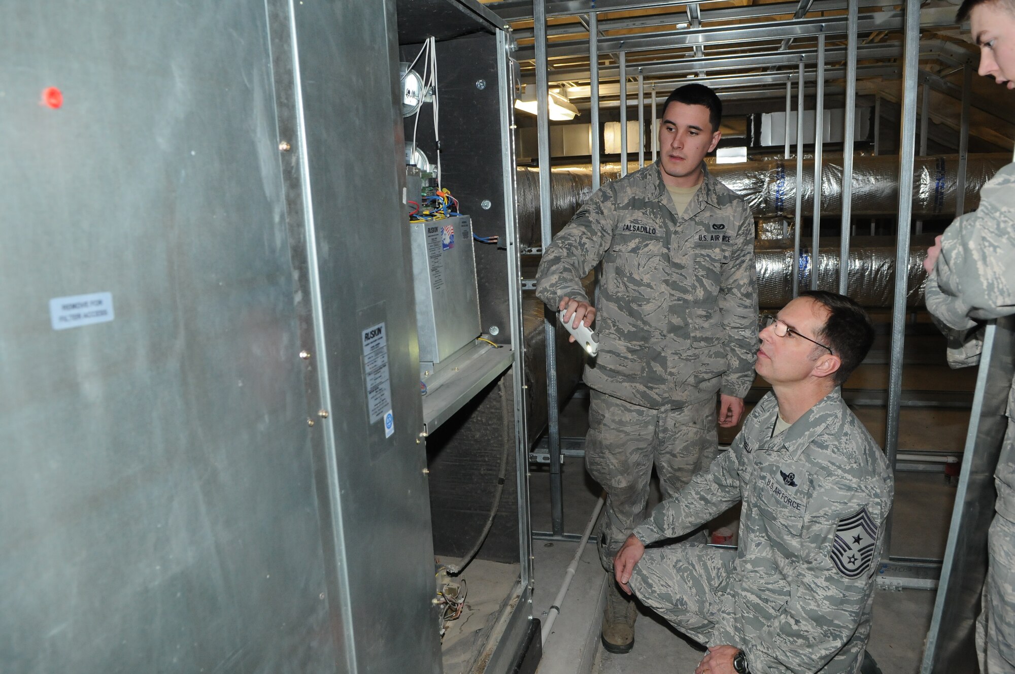 The Heating, Ventilation, Air Conditioning and Refrigeration (HVAC/R) shop works within the Operations Flight in the Civil Engineer Squadron and is responsible for sustaining 339 facilities valued $4.8B, supporting 11.6K military and civilian personnel.  The shop is manned by 39 Airmen and 8 civilians, all of whom installs, diagnose, and perform repairs on HVAC/R systems.  Additionally, the shop follows strict compliance of HAZMAT and ozone depleting gases to stay within strict EPA guidelines. (Photo courtesy of the Command Chief’s Office)