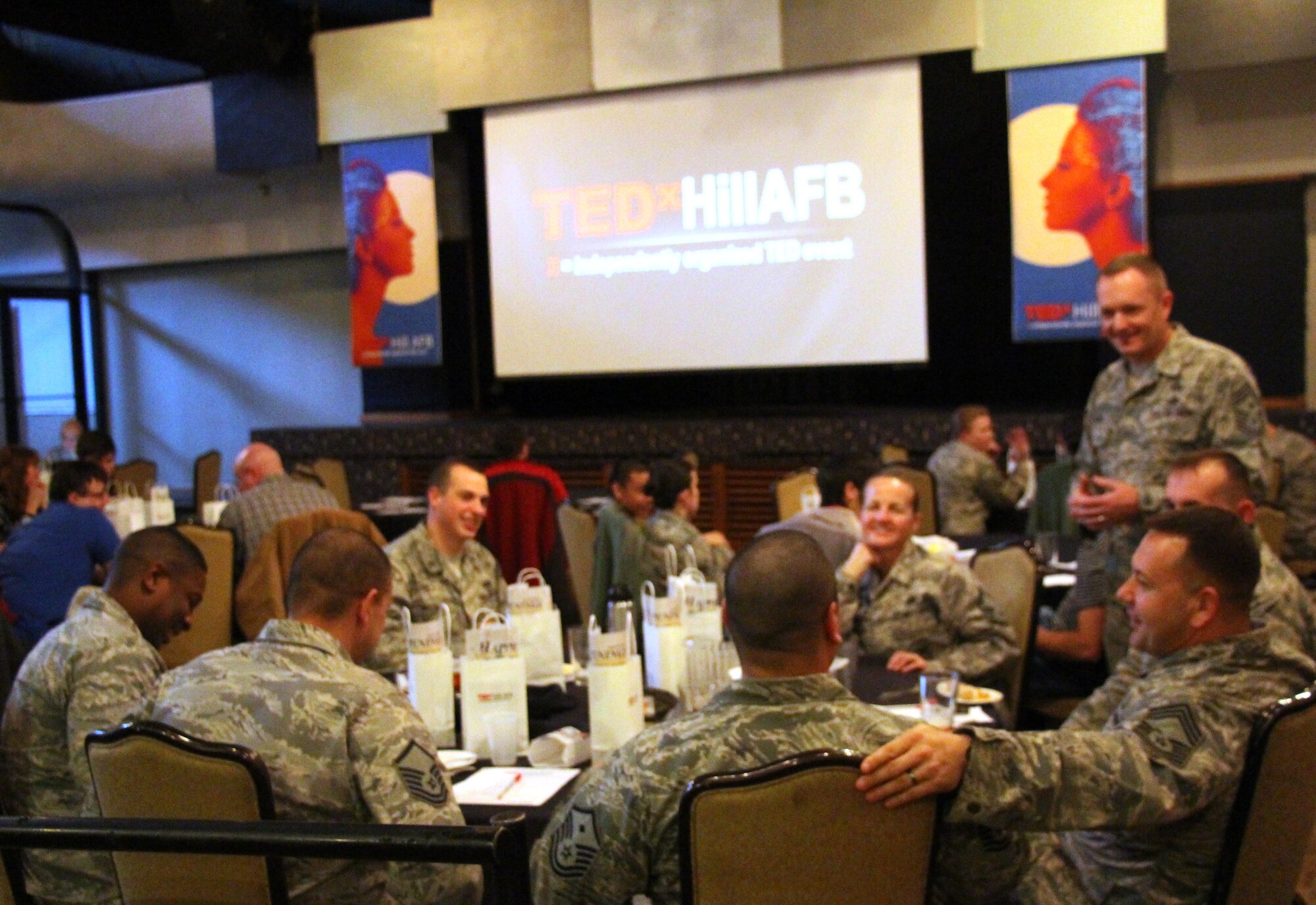 Chief Master Sgt. Jason France, 75th Air Base Wing command chief, speaks to one of several tables of participants during the TEDx event discussions Jan. 10 at Hill Air Force Base, Utah. (Courtesy photo by Barbara McConvill)