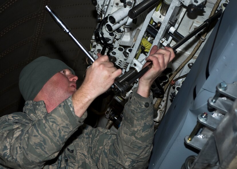 U.S. Air Force Staff Sgt. Charles Taylor, 7th Aircraft Maintenance Squadron, removes a Joint Air-to-Surface Standoff Missile-Extended Range from a B-1B Lancer Dec. 12, 2013, at Dyess Air Force Base, Texas. The 337th Test and Evaluation Squadron recently completed a captive carriage exercise with a JASSM-ER, flying close to 100 flight hours over several sorties with a single missile. (U.S. Air Force photo by Senior Airman Peter Thompson/Released)