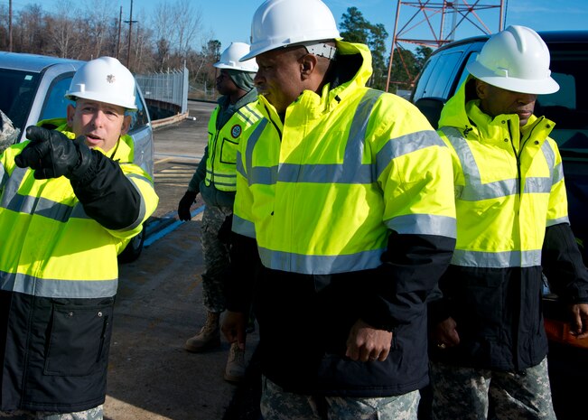 Lt. Col. Bryan Memoli(left),  841st Transportation Battalion commander,gives Col. Jason Vick, 597th Transportation Brigade commander and Sgt. Maj. Alveno Hodge, 597th Transportation Brigade command sergeant major, a tour of the USNS Pomeroy (T-AKR-316), Jan. 7, 2014 at Joint Base Charleston – Weapons Station, S.C. Vick was in Charleston to visit the 841st Transporation Battalion.. During his visit, he also met with Col. Jeffery DeVore, Joint Base Charleston commander and toured the Army Strategic Logistics Activity Charleston. (Air Force photo/Staff Sgt. William O’Brien)