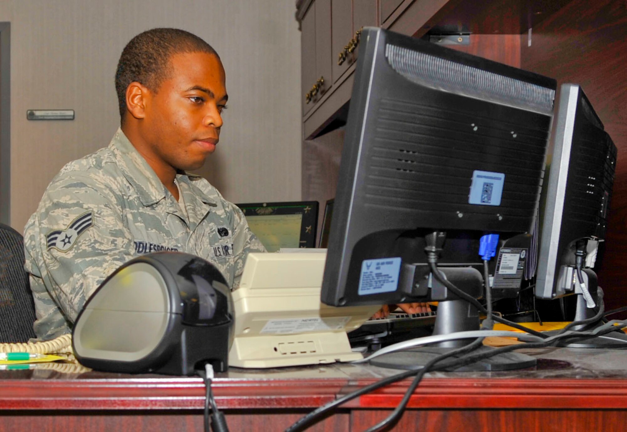 Senior Airman Danny Riddlespriger, 2nd Bomb Wing adverse actions paralegal, prepares for the upcoming tax season on Barksdale Air Force Base, La., Jan. 09, 2014. Barksdale's tax center helped Airmen, their families, government workers and retirees receive around $3 million in tax returns last year and saved their customers around $357,000 in tax preparation fees. (U.S. Air Force photo/Airman 1st Class Benjamin Raughton)