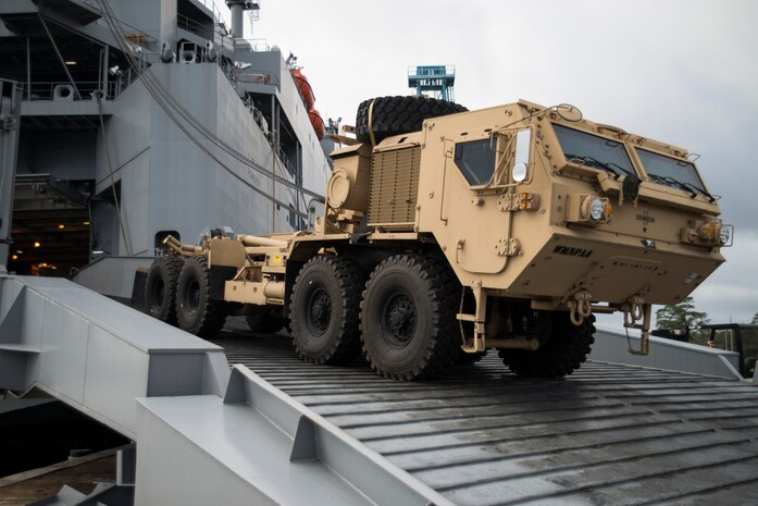 A Mine-Resistant Ambush Protected vehicle is offloaded from the USNS Pomeroy (T-AKR-316), Jan. 10, 2014, at the Joint Base Charleston – Weapons Station, S.C.  The Pomeroy holds roughly 1,400 pieces of cargo as part of the nation’s prepositioning force. The 841st Transportation Battalion will off-load and discharge all the ship’s cargo in 10 days to two weeks and the Army Strategic Logistics Activity Charleston will repair and reset the equipment before it is re-deployed. (U.S. Air Force photo/Senior Airman Ashlee Galloway)