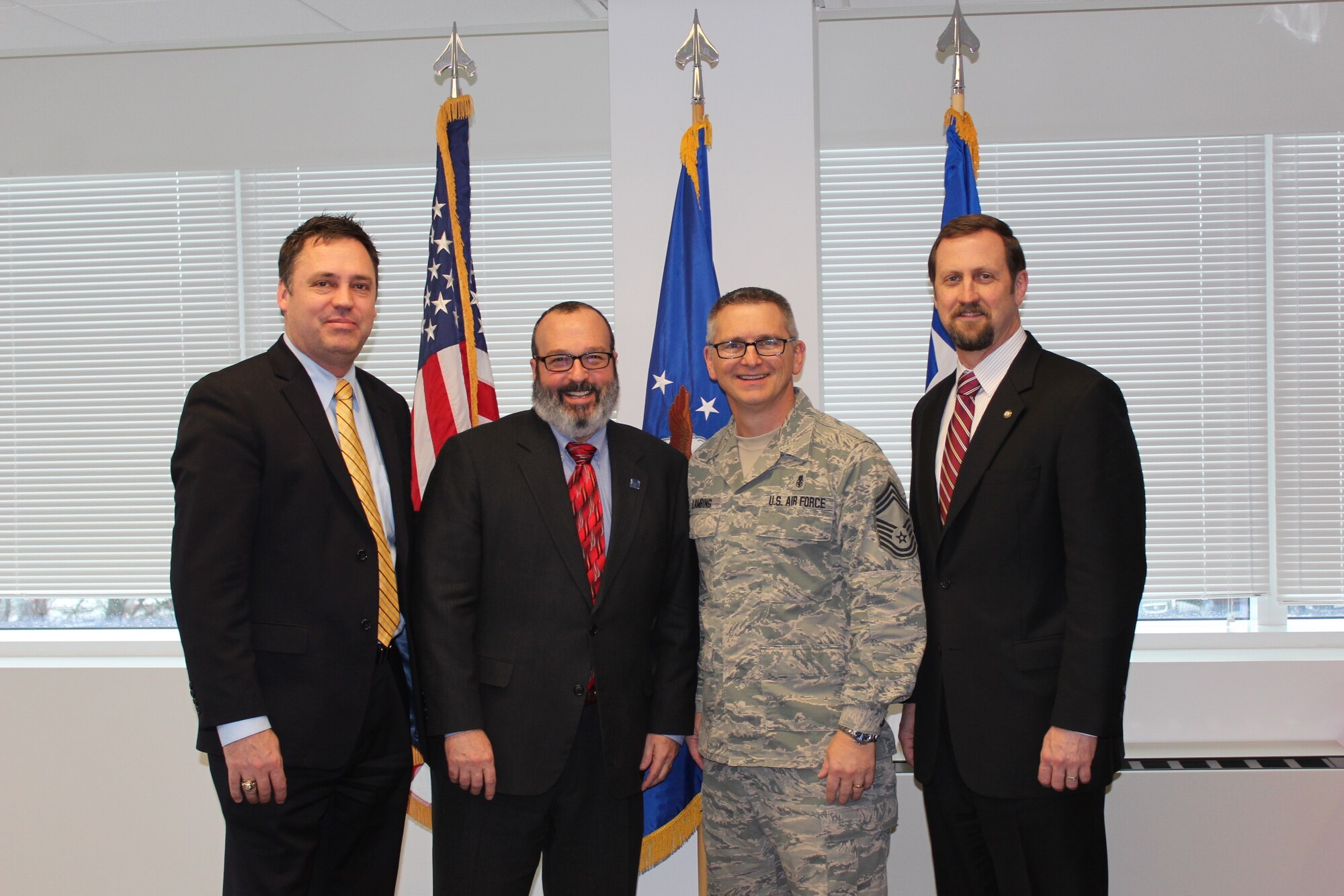 During the Air Force Medical Service's senior leader visit to the Defense
Health Headquarters, current and former medical enlisted corps chiefs had
the opportunity to discuss the current state of the AFMS on Jan. 10, 2014.
Individuals in photo from left to right are retired Chief Master Sgt. Mark
Withers, retired Chief Master Sgt. David Bayliss, Chief Master Sgt. Kevin
Lambing and retired Chief Master Sgt. Charlie Cole.  (U. S. Air Force photo
by Jon Stock)
