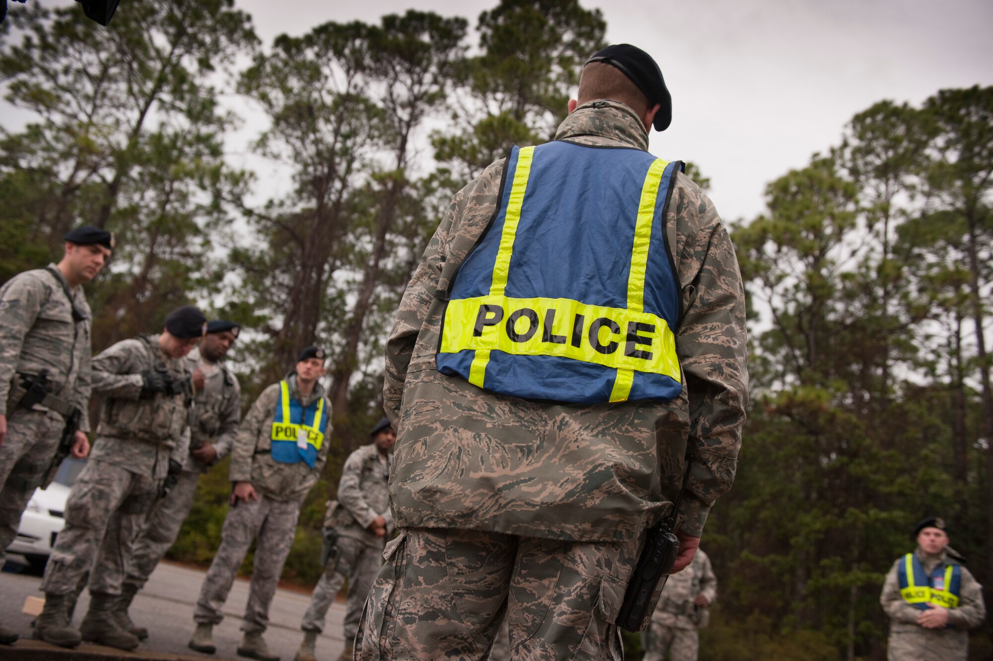 Inspectors from the 1st Special Operations Security Forces Squadron debrief SFS Airmen after an active shooter exercise on Hurlburt Field, Fla., Jan. 13, 2014. Inspectors evaluated Airmen during the exercise to ensure proper procedures were followed. (U.S. Air Force photo/Senior Airman Krystal M. Garrett) 