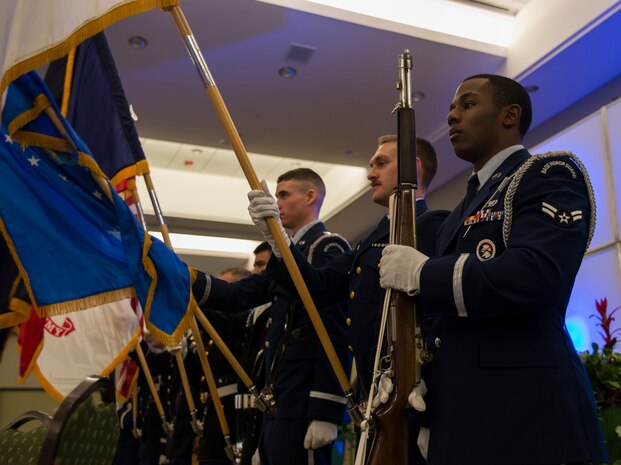Joint Base Charleston Honor Guardsmen present the colors at the Medal of Honor Bowl reception, Jan. 10, 2014, at Trident Technical College, Charleston, S.C. The Medal of Honor Bowl was held to raise money to construct a new Medal of Honor museum in Charleston. There are currently 77 living Medal of Honor recipients. (U.S. Air Force photo/Senior Airman Ashlee Galloway)