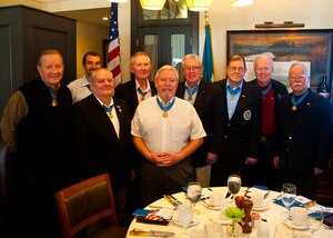 Congressional Medal of Honor recipients (in order of military rank) Maj. Gen. James Livingston, Maj. Gen. Patrick Henry Brady, Col. Donald Ballard, Col. Harvey Barnum, Jr., Lt. Col. Harold Fritz, Maj. Bruce Crandall, Lt. Cmdr. Thomas Kelley, Sgt. Maj. Kenneth Stumpf and Staff Sgt. Salvatore Giunta, pose for a photo prior to eating brunch Jan. 11, 2014 in downtown Charleston, S.C. The nine Medal of Honor recipients were in town for The Medal of Honor Bowl to raise money to construct a new Medal of Honor museum in Charleston. The Medal of Honor Bowl is a senior college all-star game pitting the American team against the National team. The American team won this year’s inaugural game 20-3. (U.S Air Force photo/William O’Brien)
