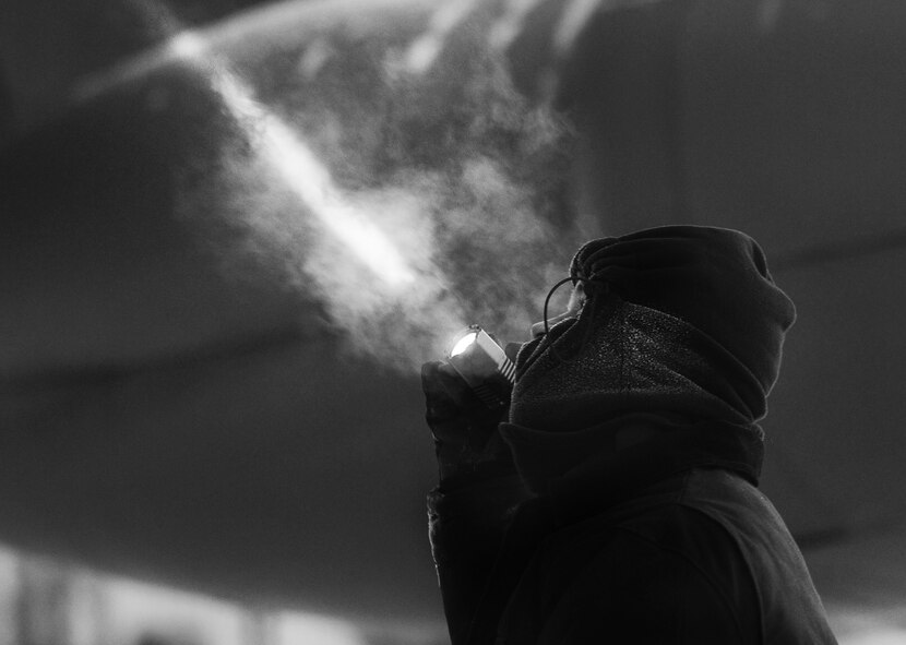 Maintenance Airmen, crew chiefs and flight crews work together in frigid weather conditions to ensure the successful launch of their B-52H Stratofortresses at Minot Air Force Base, N.D. Jan. 7. Crew chiefs and maintenance Airmen work long hours in a difficult and austere environment to meet the demands of their mission. Strong communication skills, job knowledge and working with a tight nit team helps to guarantee their success. (U.S. Air Force photos/Senior Airman Stephanie Sauberan and Airman 1st Class Andrew Crawford)