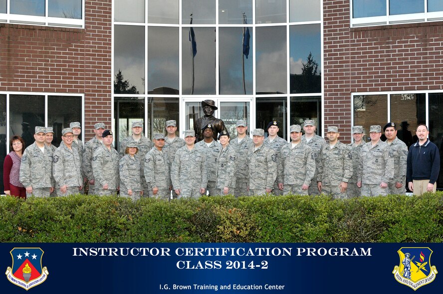 MCGHEE TYSON AIR NATIONAL GUARD BASE, Tenn. - Twenty students and their instructors take a break from the classroom Jan. 14, 2014, for a Class 2014-2 photo in the U.S. Air National Guard Instructor Certification Program. The two-week ICP here at the I.G. Brown Training and Education Center, Jan. 6 to Jan. 17, prepared the professional military education instructors to develop lesson plans, analyze student needs and give informal lectures and demonstrations as well as provides training in the philosophy, methodologies and practice of the Instructional Systems Design model. Training included how to design educational academic or criterion objectives and student materials and teach using different methodologies. The students developed evaluative instruments such as multiple choice test questions and performance evaluations to ensure educational objectives. Students also analyzed test data, participated in student counseling sessions and provided effective feedback to other students in the course. (U.S. Air National Guard photo by Master Sgt. Mike R. Smith/Released)