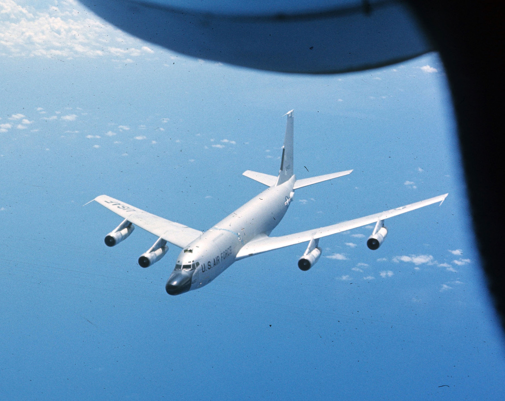 Highly-capable RC-135s -- like this RC-135M COMBAT APPLE aircraft -- conducted communications and electronic intelligence. For most of the Southeas Asia War, unarmed RC-135s maintained a continuous, 24-hour orbit near the border of North Vietnam. (U.S. Air Force photo)