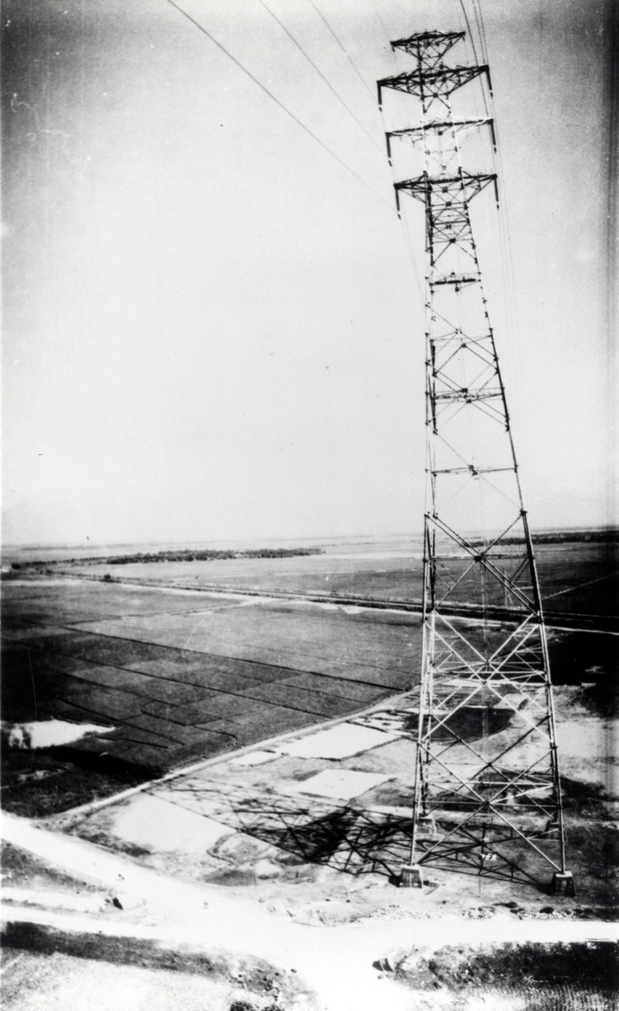 An AQM-34L took this photograph as it flew underneath electrical lines in North Vietnam. The image distortion was a normal effect caused by the type of lens used. (U.S. Air Force photo)