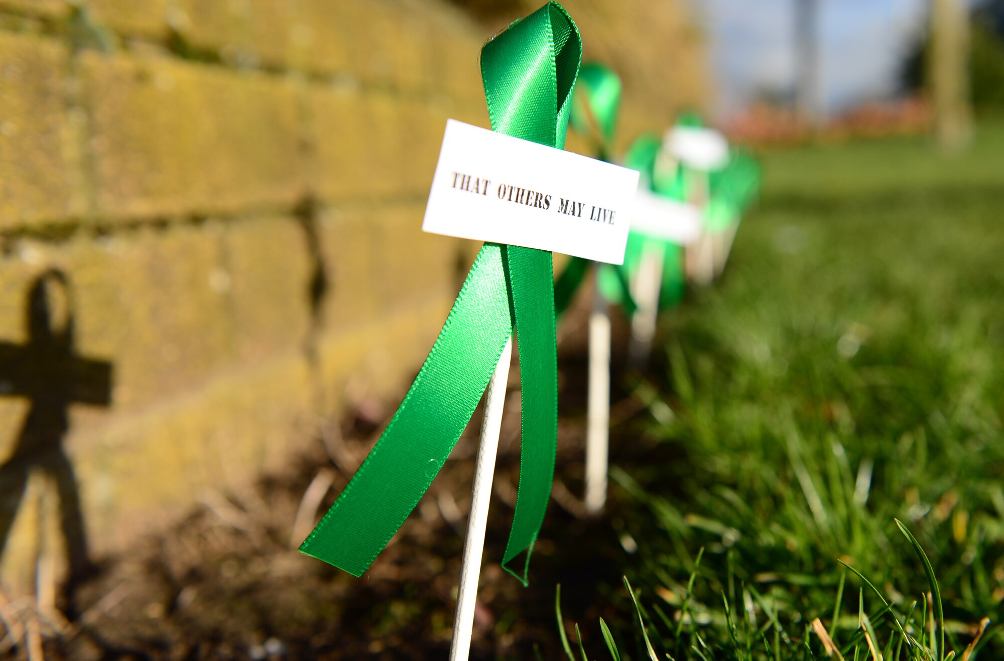 Green ribbons have been placed around Royal Air Force Lakenheath, England, in honor of the four Airmen killed in the HH-60G Pave Hawk helicopter crash, Jan. 7, 2014. The Airmen were members of the 56th Rescue Squadron, also known as the Jolly Green Giants. Anyone from the United States wishing to send condolence cards or messages may send them to RAF Lakenheath, Building 1063, 48th Fighter Wing Public Affairs, Unit 5203, APO, AE 09461 or 48FW.PA@us.af.mil.  (U.S. Air Force photo by Airman 1st Class Dawn M. Weber) 