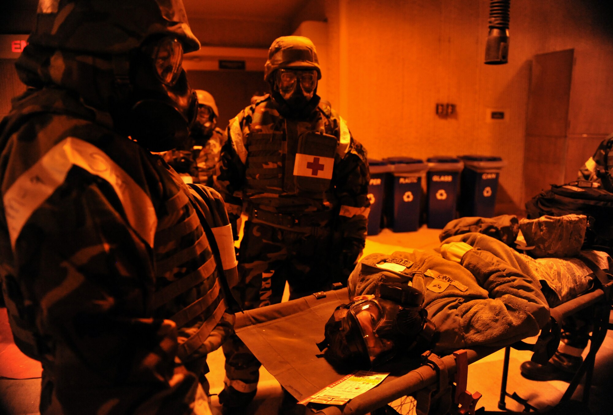 A simulated chemical attack victim waits to be taken inside the 51st Medical Group during Operational Readiness Exercise Beverly Midnight 14-01 at Osan Air Base, Republic of Korea, Jan. 13, 2014. To avoid the potential spread of chemical contaminates, chemical attack victims must be processed through decontamination areas prior to entering the medical facility. (U.S. Air Force photo/Senior Airman Siuta B. Ika)