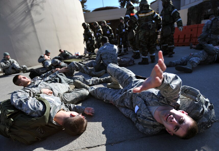 Simulated casualties await care during Operational Readiness Exercise Beverly Midnight 14-01 at Osan Air Base, Republic of Korea, Jan. 13, 2014. Personnel were triaged according to the severity of their injuries to ensure those with the most critical need for care would be treated first. (U.S. Air Force photo/Senior Airman Siuta B. Ika)