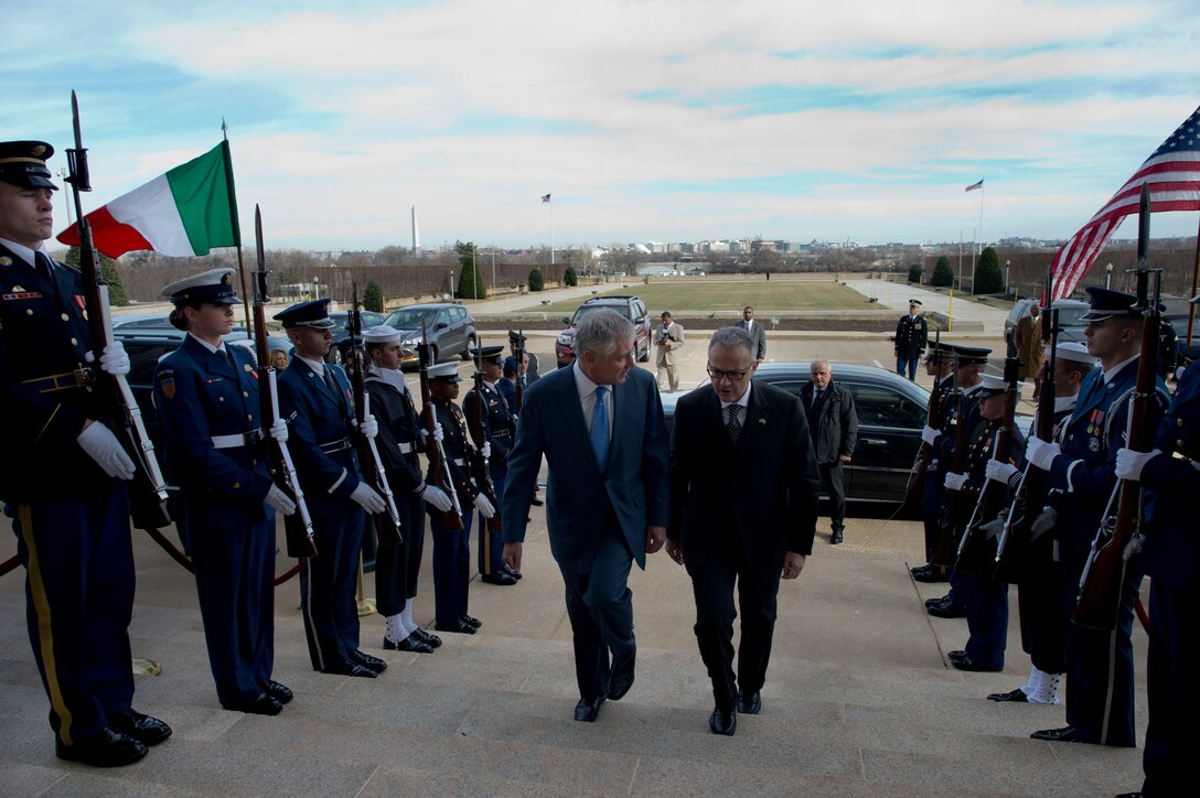 Defense Secretary Chuck Hagel escorts Italian Defense Minister Mario Mauro through an honor cordon at the Pentagon, Jan. 13, 2014. Hagel and Mauro met to discuss global security and cooperative efforts such as the joint strike fighter program. DOD photo by Erin A. Kirk-Cuomo
