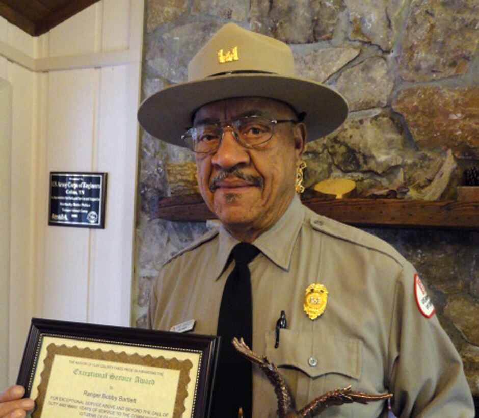 Bobby Bartlett, a U.S. Army Corps of Engineer Nashville District Park Ranger received two awards for his volunteer service with youth in the corps Water Safety program at the Kentucky State Police Trooper Island Camp. Photo by Sondra Carmen/USACE