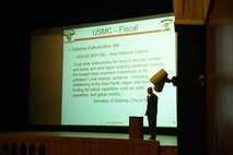 Lt. Col. Craig Clemans, the commanding officer of 2nd Maintenance Battalion, Combat Logistics Regiment 25, 2nd Marine Logistics Group discusses the Defense Authorization Bill during a town hall meeting aboard Camp Lejeune, N.C., Jan. 13, 2014. Clemans also discussed the year in review and what potential threats the battalion should be ready to react to. (U.S. Marine Corps photo by Lance Cpl. Shawn Valosin)