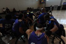 Air Force wounded warriors rally during a break in the wheelchair basketball game against the Aloha Hawaii local team during the inaugural Wounded Warrior Pacific Invitational at Joint Base Pearl Harbor-Hickam, Hawaii, Jan. 9, 2014. (U.S. Air Force photo/Master Sgt. Matthew McGovern)