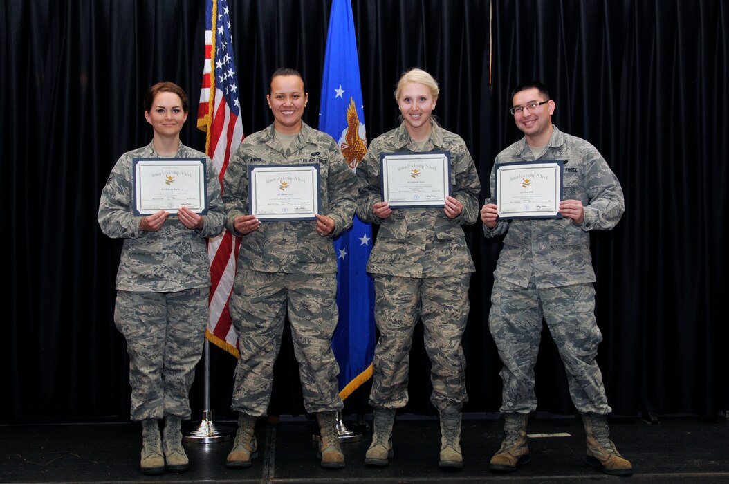 From left: Senior Airman Becky Bagley, 130th Engineering Installation Squadron; Senior Airman Tammy Annis, 151st Force Support Squadron; Senior Airman Jennelle Lewis, 151st Medical Group; and Senior Airman Jesse Betts, 151st Logistics Readiness, graduated from the Airman Leadership School at Hill Air Force Base, on December 20, 2013. (Utah National Guard Photo by SSgt Annie Edwards/released)