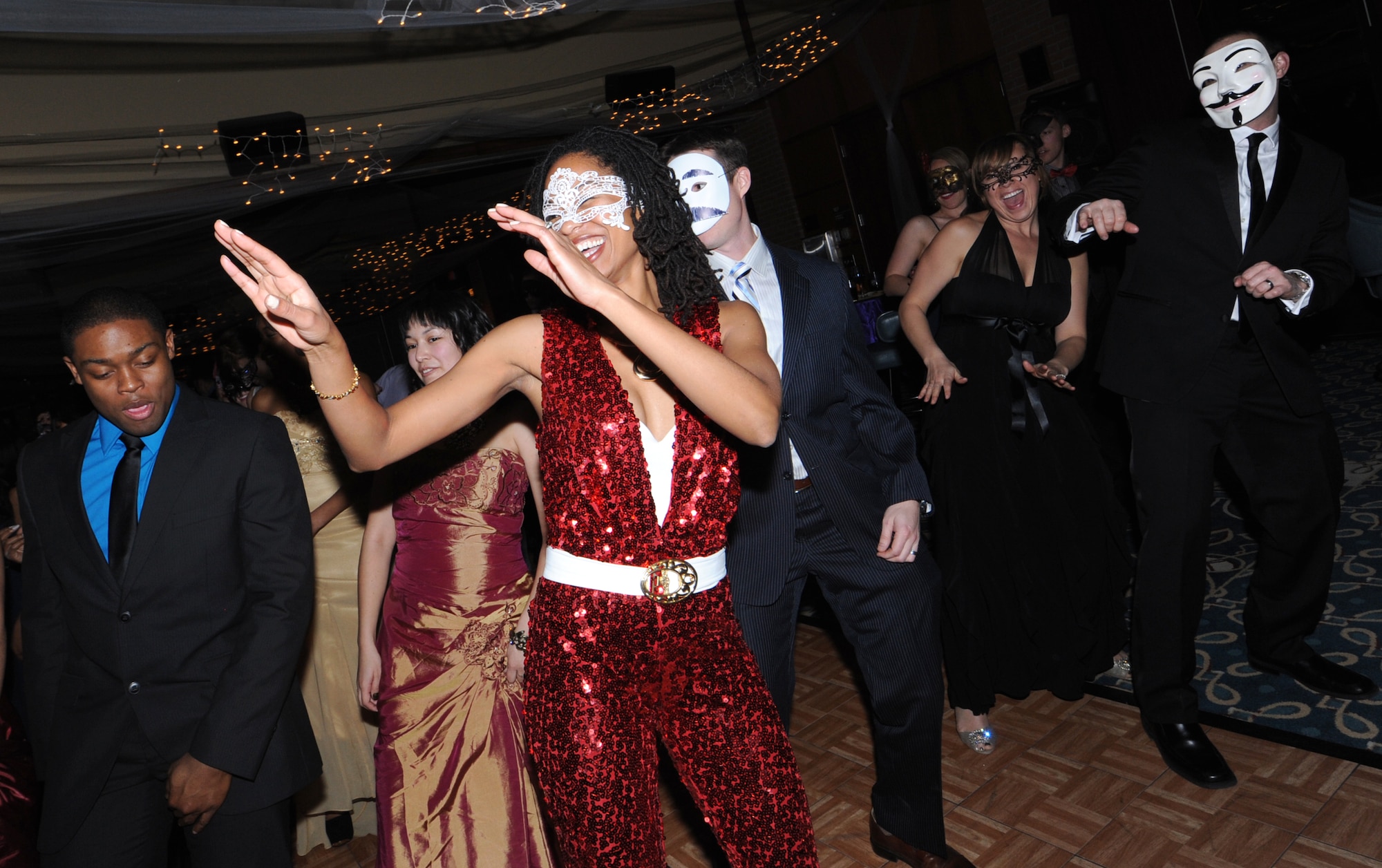 Almost 100 Team Vance members attended the first-ever Masquerade Ball, Jan. 11, at the Vance Collocated Club. (U.S. Air Force photo/ Senior Airman Frank Casciotta)