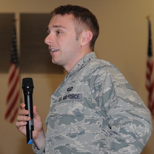 1st Lt. Ryan Walton, Air Force Global Strike Command operations research analyst, asks a question during the question & answer portion of a town hall meeting on Barksdale Air Force Base, La., Jan. 14. The meeting was held to discuss Air Force-level force shaping efforts that will occur in the near future. (U.S. Air Force photo/Senior Airman Kristin High)