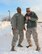Chaplain's assistant Tech. Sgt. Jonique Young and public affairs superintendent Tech. Sgt. Christopher Parr, brave cold temperatures just before the January unit training assembly and check out the mountain of snow left behind by the 15 inch storm.  What will the rest of winter 2014 surprise us with?  Always check the local television stations and your own roads before heading out on slick highways.  (U.S. Air Force photo by Maj. Stan Paregien).