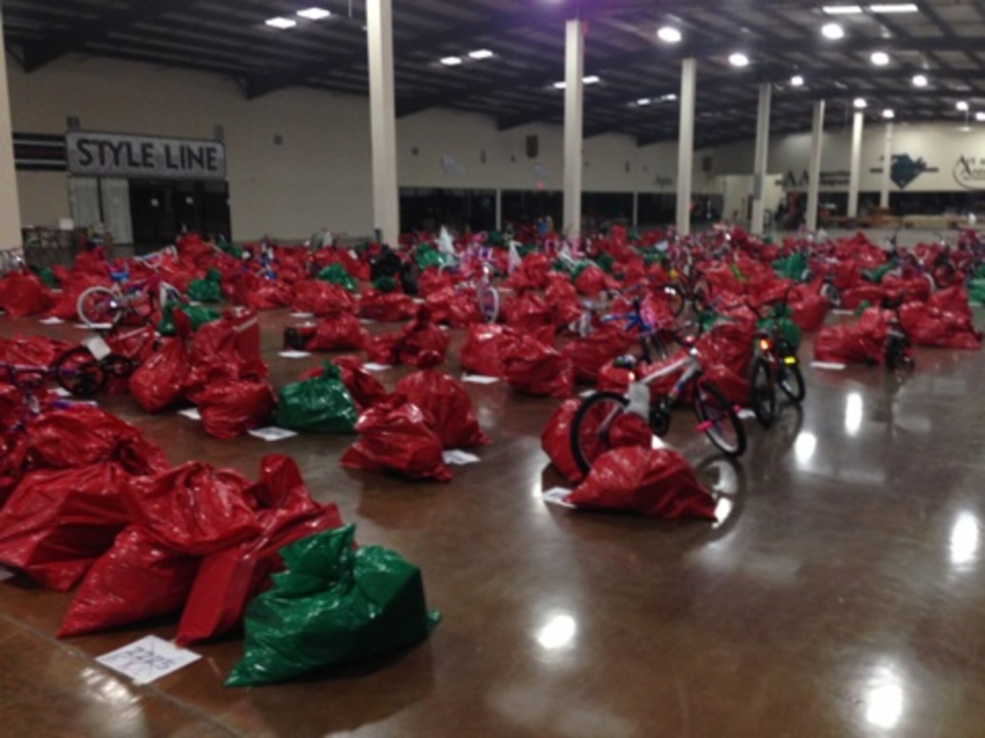 Staff Sgt. Charles Hefner and 12 members of his Delayed Entry Program prepared Christmas gifts for the Angel Tree program in Tupelo, Miss., Dec. 20. (U.S. Air Force photo)