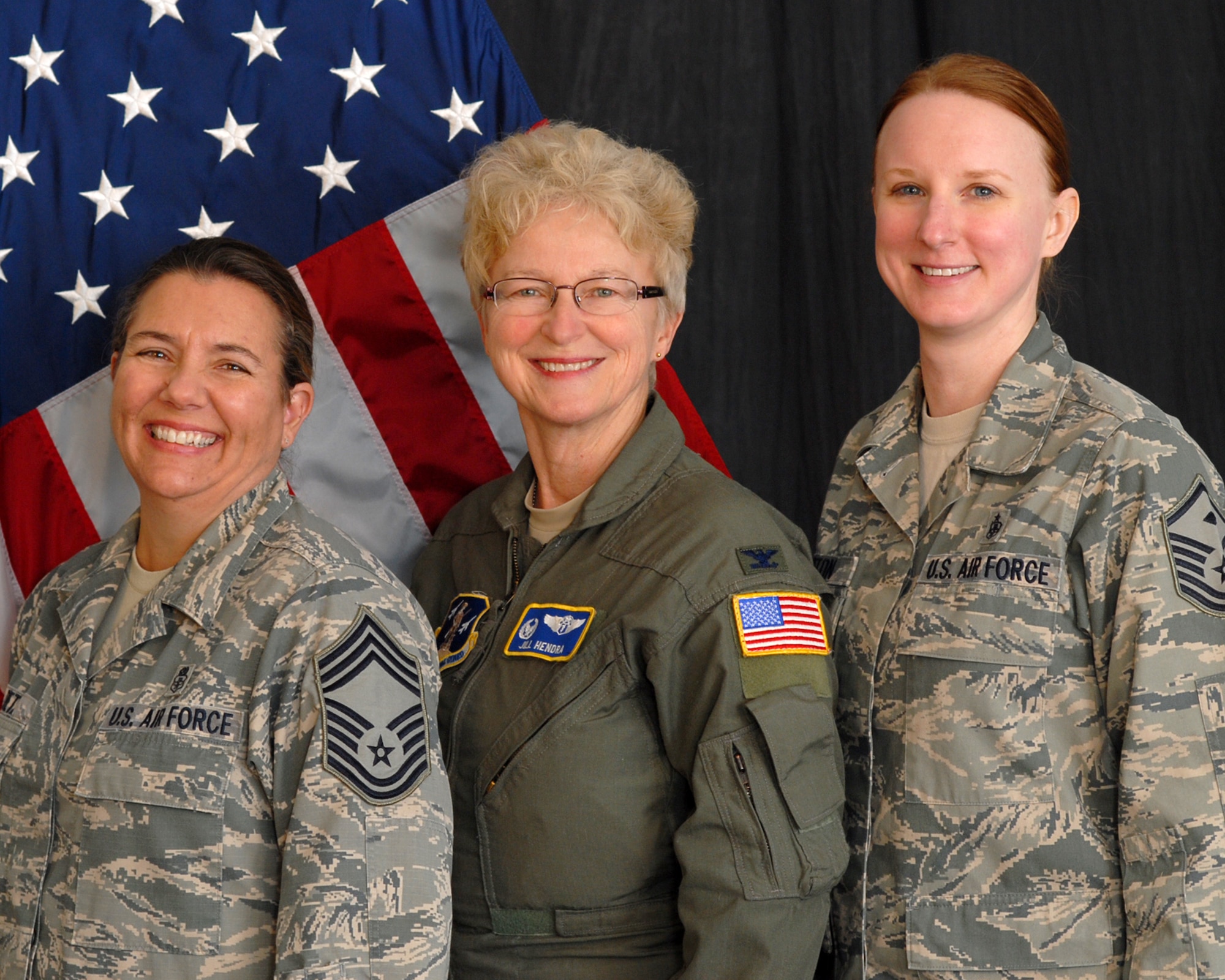 U.S. Air Force Chief Master Sgt. Susan Dietz, first female Chief Enlisted Manager for the145th Medical Group, Col. Jill Hendra, first female commander 145th MDG, and Master Sgt. Maria Gupton, first female “1st Shirt” 145th MDG, pose for portrait at the North Carolina Air National Guard base, Charlotte-Douglas Intl. airport, Jan. 8, 2014.  The North Carolina Air National Guard makes history with top three medical positions being led by women. (Air National Guard photo by Master Sgt. Patricia F. Moran/Released)