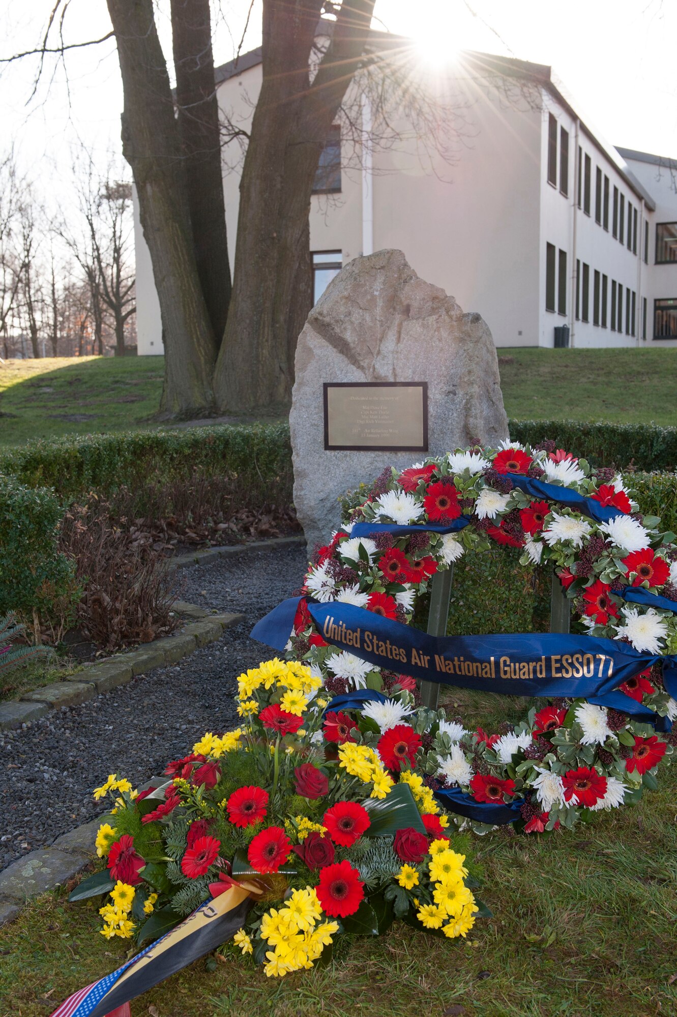A memorial stone sits on base at Geilienkirchen Air Base, Germany, Jan. 10, 2014 in remembrance of the crash of a 141st Air Refueling Wing, Fairchild Air Force Base KC-135E Stratotanker. The memorial was erected for "ESSO 77" crew members: Maj. David Fite, Maj. Mattew Laiho, Capt. Kenneth Thiele and Tech. Sgt. Richard Visintainer who perished in the crash Jan. 13, 1999.(NATO E-3A component Photo By  Mr. Andre Joosten/Released)