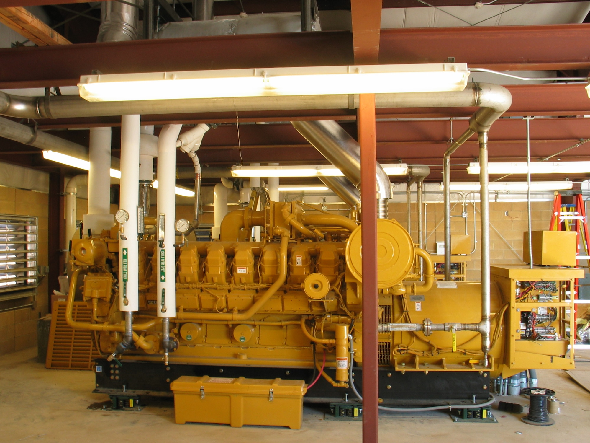 HILL AIR FORCE BASE, Utah -- The Air Force's first landfill gas generators went into operation in 2006 at Hill. The facility includes three generators and produces 2.3 megawatts of electricity per year. The Air Force's second landfill gas generation facility opened in 2013 at Joint Base Elmendorf-Richardson, Alaska. It houses five generators and creates seven megawatts of electricity per year, the highest-producing single renewable energy project in the Air Force. Cases such as these where public landfills are close to a base are rare, so Air Force Civil Engineer Center engineers plan to investigate closed Air Force landfills to search for new opportunities. (U.S. Air Force photo)