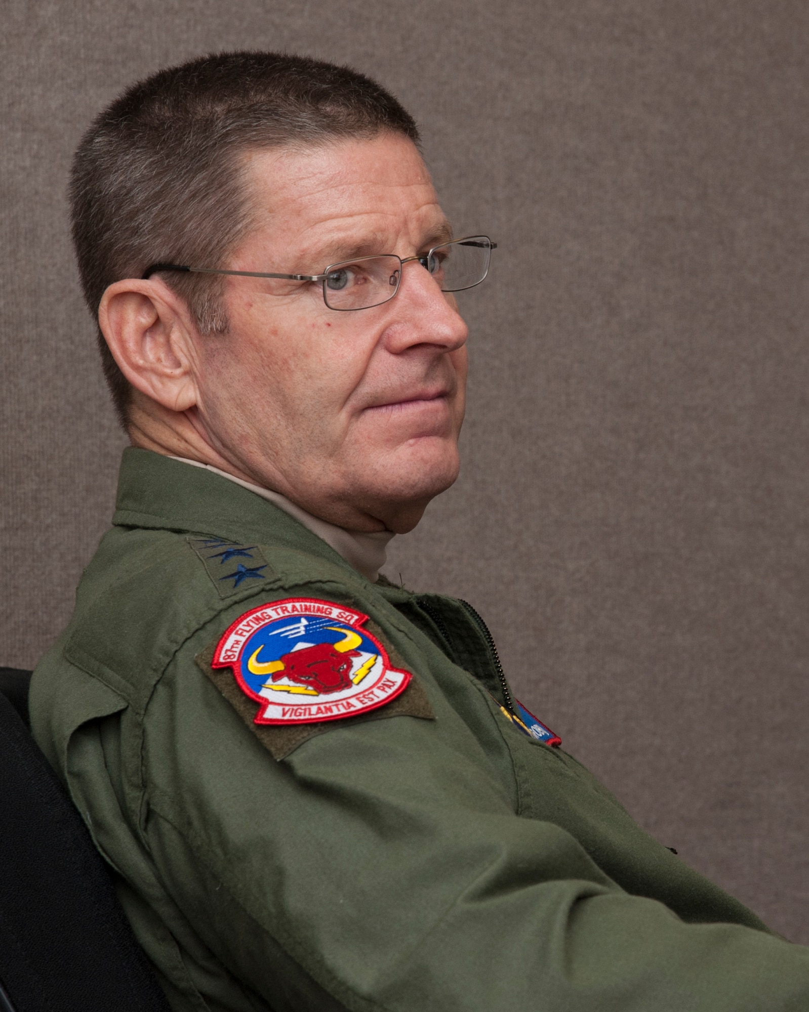 Gen. Robin Rand, Air Education and Training Command commander, listens to a briefing at Laughlin Air Force Base, Texas, Jan. 9, 2014. Rand also briefed hundreds of Laughlin airmen, stating, “We have to define the new norm, and I need your help,” said Rand. “We are not going to do more with less. We are counting on you to tell us what to do less of to keep quality up. If we are doing so much of one thing that we can’t do another, tell your leadership.” (U.S. Air Force photo/Senior Airman Nathan Maysonet)