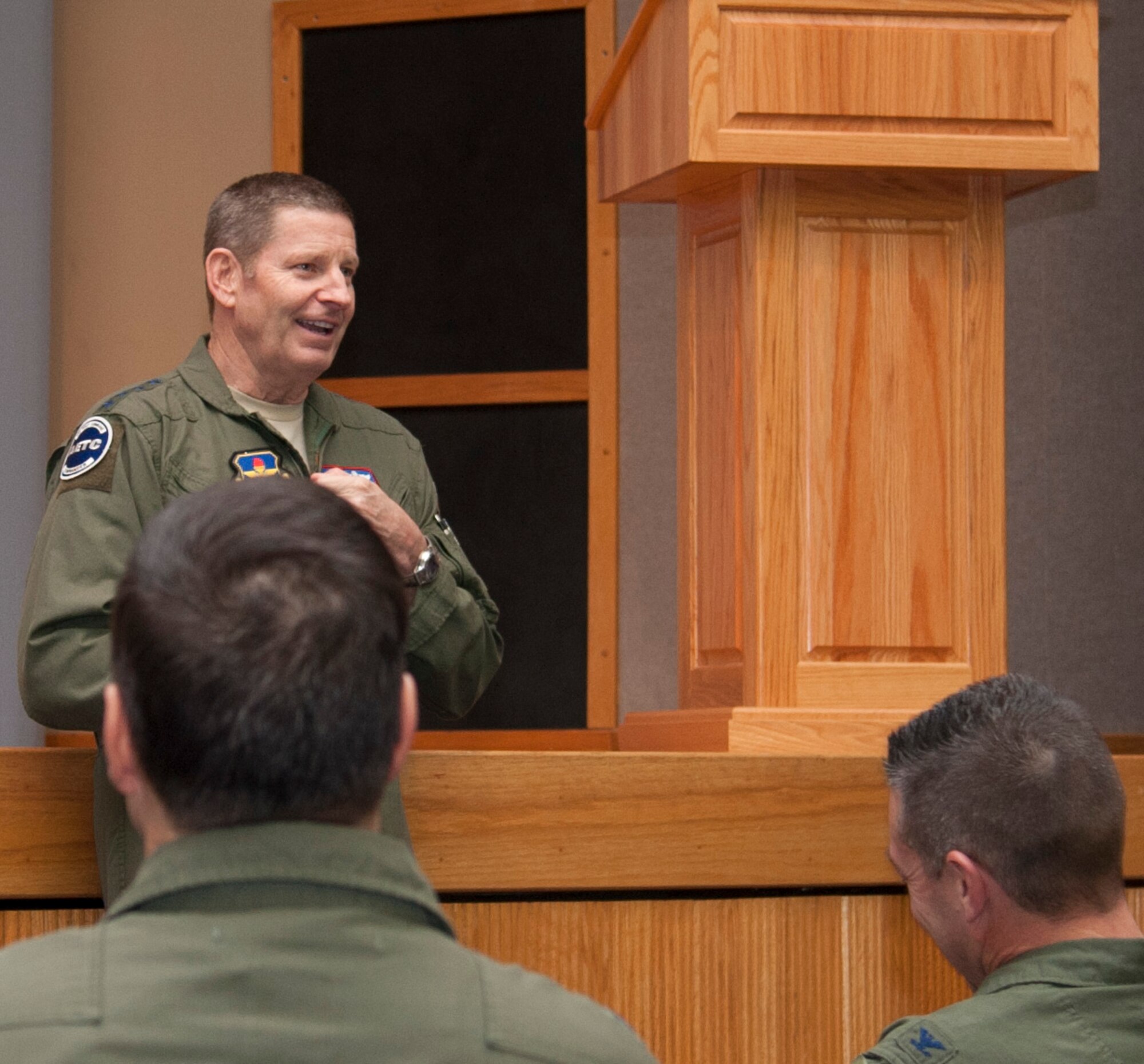 Gen. Robin Rand, Air Education and Training Command commander, briefs Laughlin senior non-commissioned officers about force reshaping at Anderson Hall on Laughlin Air Force Base, Texas, Jan. 8, 2014. During his visit he spoke to airmen and answered any questions about force reshaping. (U.S. Air Force photo/Airman 1st Class Jimmie D. Pike)