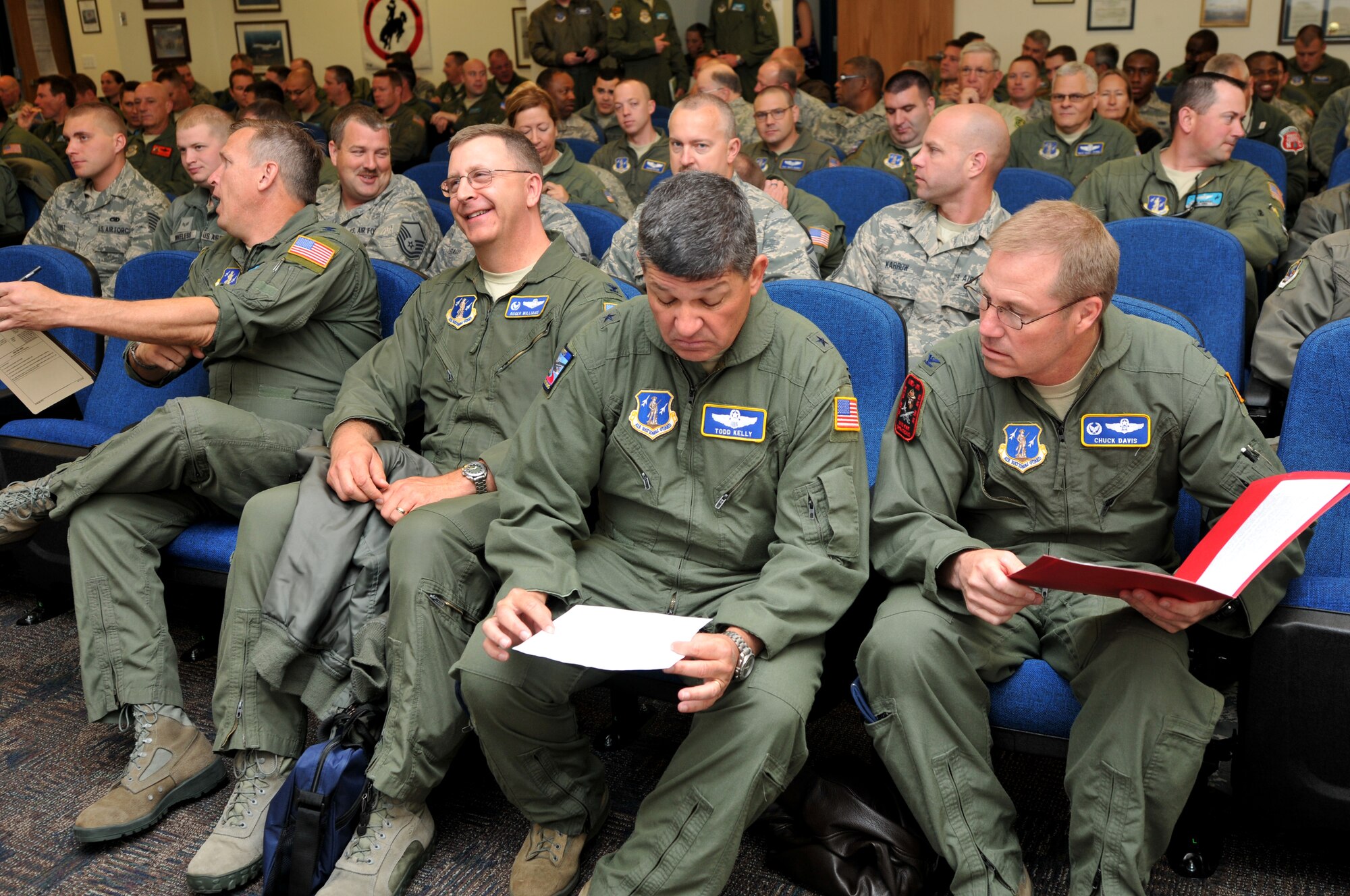 U.S. Air Force Col. Charles D. Davis, III, Air Expeditionary Group commander, Brig. Gen. Todd Kelly, N.C. assistant adjutant general-Air and Col. Roger E. Williams, Jr., commander 145th Airlift Wing, North Carolina Air National Guard, listen to briefings May 6, 2013, during the start of the annual Modular Airborne Fire Fighting System (MAFFS) training. This year’s MAFFS training will once again be hosted by the 153rd Airlift Wing, Wyoming Air National Guard, at the Cheyenne Regional Airport, Cheyenne, Wyo. (U.S. Air National Guard photo by Master Sgt. Patricia F. Moran/Released)