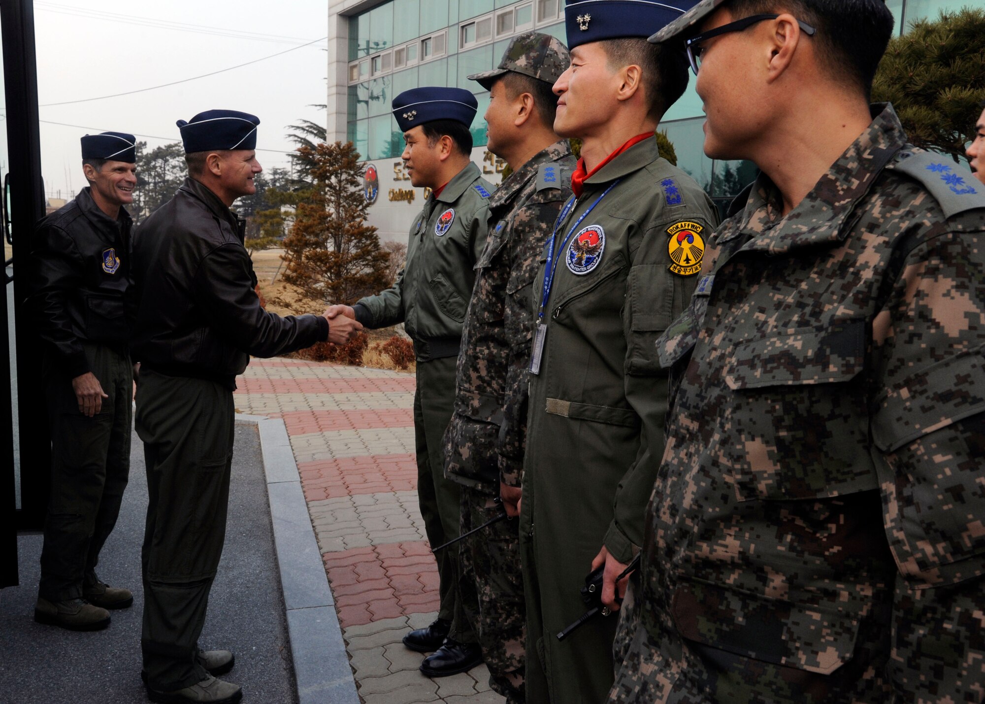 Brigadier Gen. Russell Mack, 7th Air Force vice commander, greets Republic of Korea air force 38th Fighter Group leaders at Kunsan Air Base, Republic of Korea, Jan. 10, 2014. Meeting with ROKAF leadership was part of the general’s familiarization visit to Kunsan. (U.S. Air Force photo by Staff Sgt. Jessica Haas/Released)