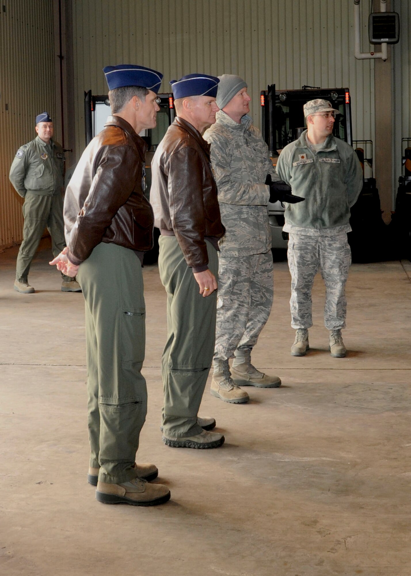 Brigadier Gen. Russell Mack, 7th Air Force vice commander, receives a briefing from members of the 8th Logistics Readiness Squadron at Kunsan Air Base, Republic of Korea, Jan. 10, 2014. The general was briefed on the 8th LRS mission and proposed ways to improve unit effectiveness. (U.S. Air Force photo by Staff Sgt. Jessica Haas/Released)