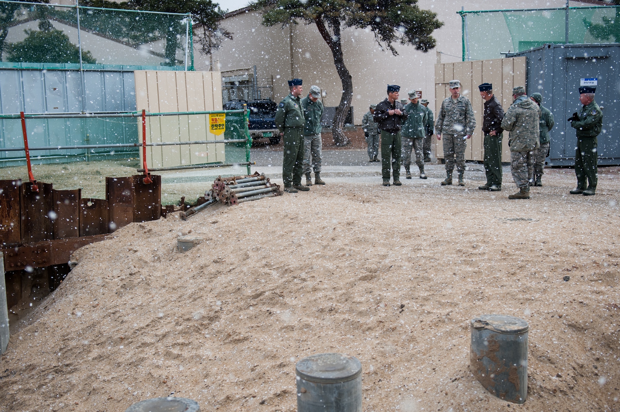 Brigadier Gen. Russell Mack, 7th Air Force vice commander, visits a
construction site at Kunsan Air Base, Republic of Korea, Jan. 10, 2014. During his tour Mack was briefed on current and planned projects and how they will affect the base. (U.S. Air Force photo by Senior Airman Clayton
Lenhardt/Released)
