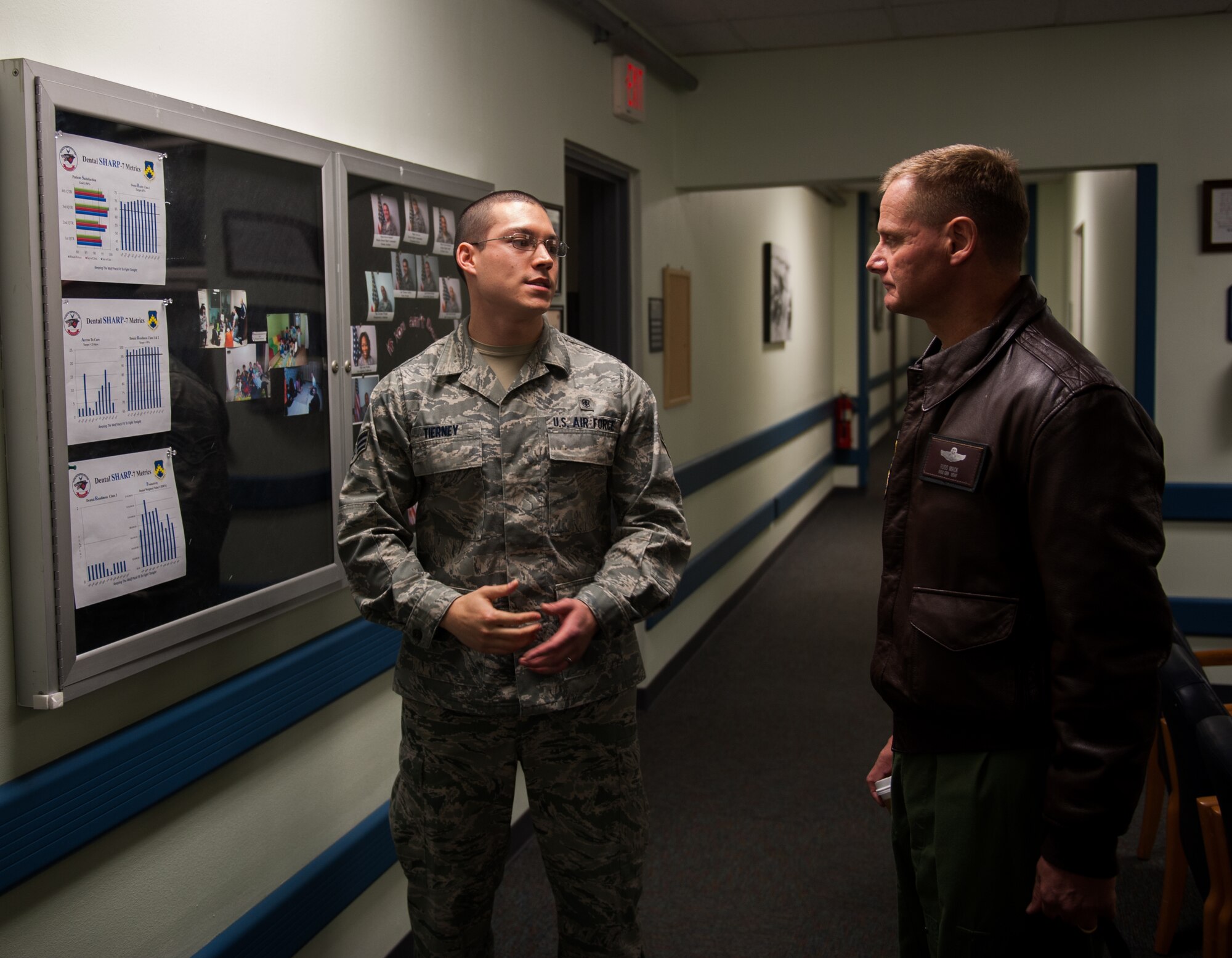 Senior Airman David Tierney, 8th Medical Operations Squadron dental technician, briefs Brig. Gen. Russell Mack, 7th Air Force vice commander, on dental clinic operations at Kunsan Air Base, Republic of Korea, Jan. 10, 2014. Mack visited the base to familiarize himself with the Wolf Pack mission. (U.S. Air Force photo by Senior Airman Clayton Lenhardt/Released)