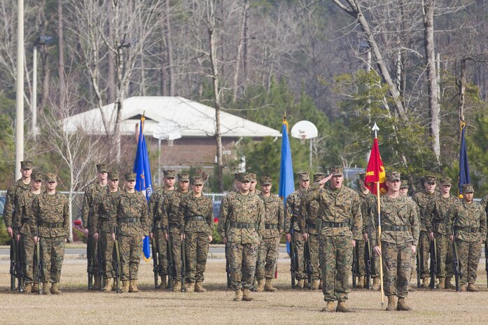 U.S. Marine Corps Capt. David M. Grant, a combat engineer officer with 8th Engineer Support Battalion, 2nd Marine Logistics Group, gives a report during a traditional change of command ceremony at Soiffert field aboard Camp Lejeune, N.C., Jan. 15, 2014. In a change of command ceremony, the company officer gives a report of accountability of each company in the battalion.