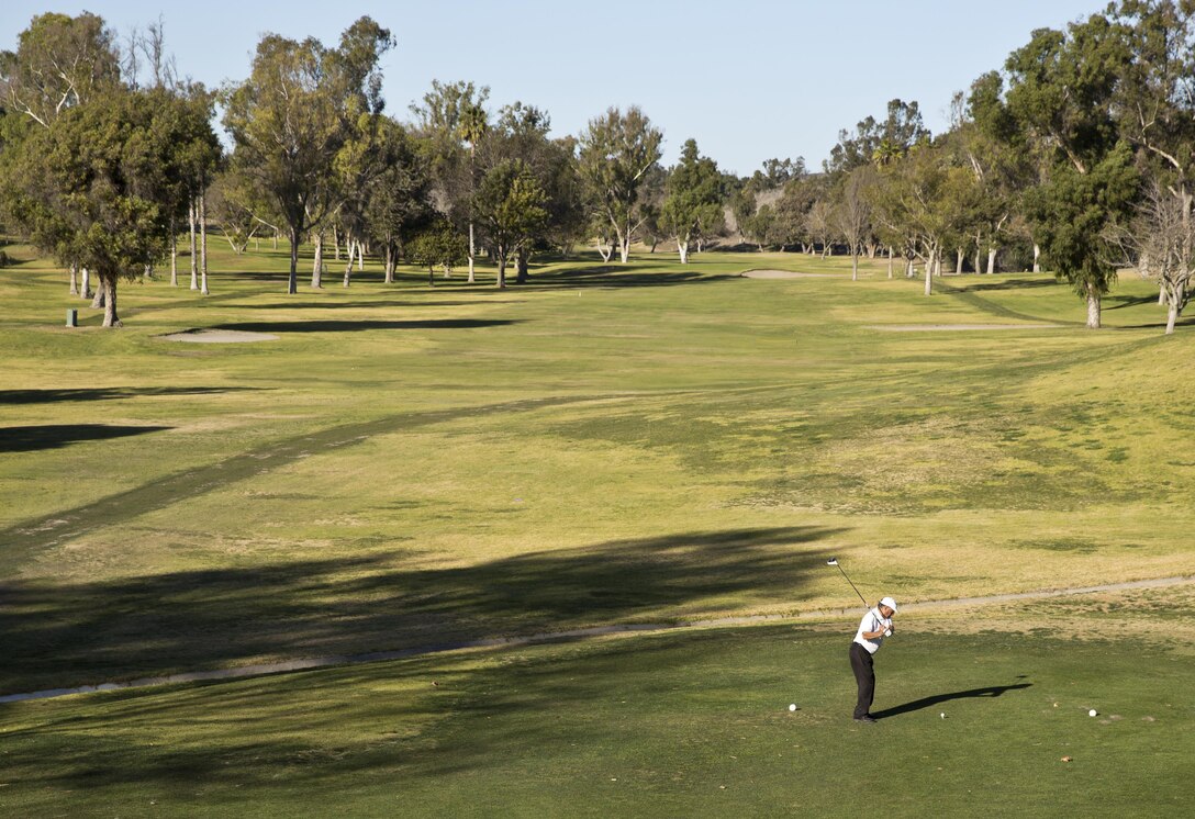 A golfer makes his driving swing on Hole 1 of the Marine Memorial Golf Course on Wednesday, Jan. 15. The Marine Memorial Golf Course is open to everyone, not just active-duty military and Department of Defense employees.