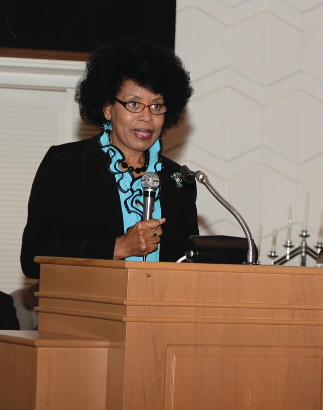 Sandra Webb, keynote speaker at the 2014 Dr. Martin Luther King Jr. ceremony, speaks to Marines, civilian-Marines and local community leaders, Tuesday, at the Base Chapel aboard Marine Corps Logistics Base Albany.