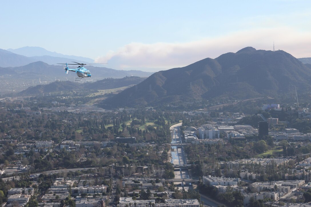 Maj. Gen. John W. Peabody, Deputy Commanding General, Civil and Emergency Operations, visited the Los Angeles District Jan. 16 and toured some of the District's projects via helicopter. The sky is hazy in several photos because of a fire blazing in the mountains near downtown Los Angeles. 