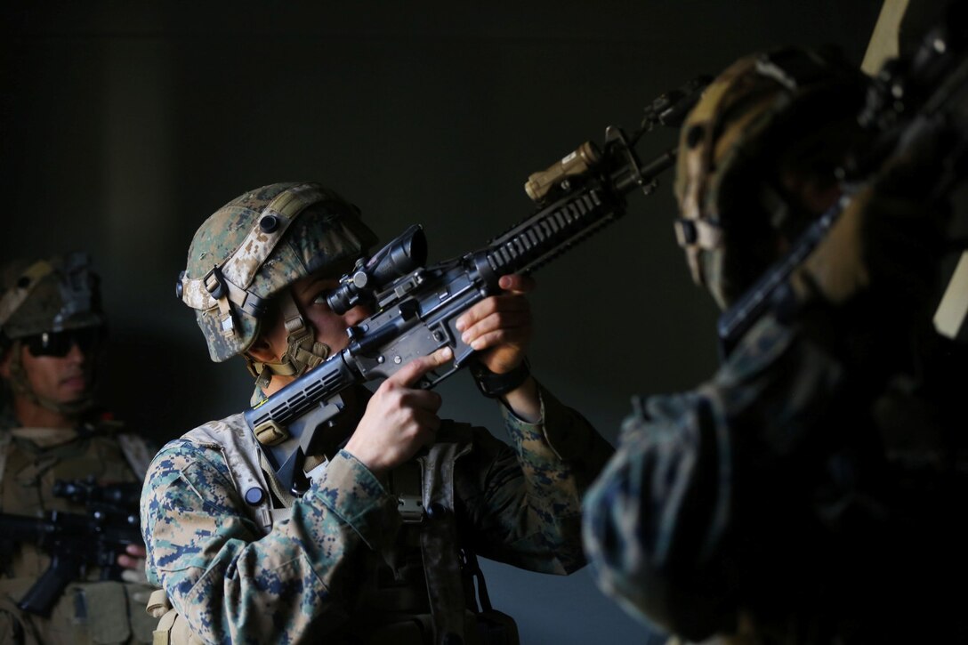 Marines with Alpha Company, 1st Battalion, 5th Marine Regiment, practice proper techniques to clear a stairway during an Urban Operations exercise at Marine Corps Base Camp Pendleton, Calif., Jan. 9, 2014. Each building is designed differently to offer an unpredictable layout that Marines would normally experience in UO. The rooms are filled with distracting elements including holes in the walls, open ceilings and multiple doorways. (U.S. Marine Corps photo by Lance Cpl. Christopher J. Moore/Released)