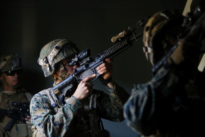 Marines with Alpha Company, 1st Battalion, 5th Marine Regiment, practice proper techniques to clear a stairway during an Urban Operations exercise at Marine Corps Base Camp Pendleton, Calif., Jan. 9, 2014. Each building is designed differently to offer an unpredictable layout that Marines would normally experience in UO. The rooms are filled with distracting elements including holes in the walls, open ceilings and multiple doorways. (U.S. Marine Corps photo by Lance Cpl. Christopher J. Moore/Released)