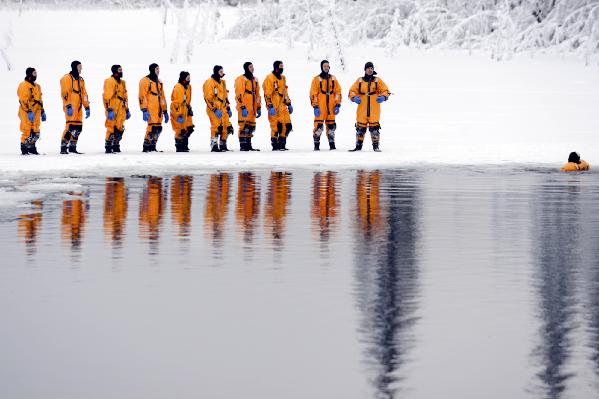 One of the firefighter volunteers to be a victim during 673d Civil Engineer Squadron firefighter ice water rescue training Jan. 13, 2014, Upper Sixmile Lake, Joint Base Elmendorf-Richardson, Alaska. (U.S. Air Force photo/Staff Sgt. Sheila deVera)

