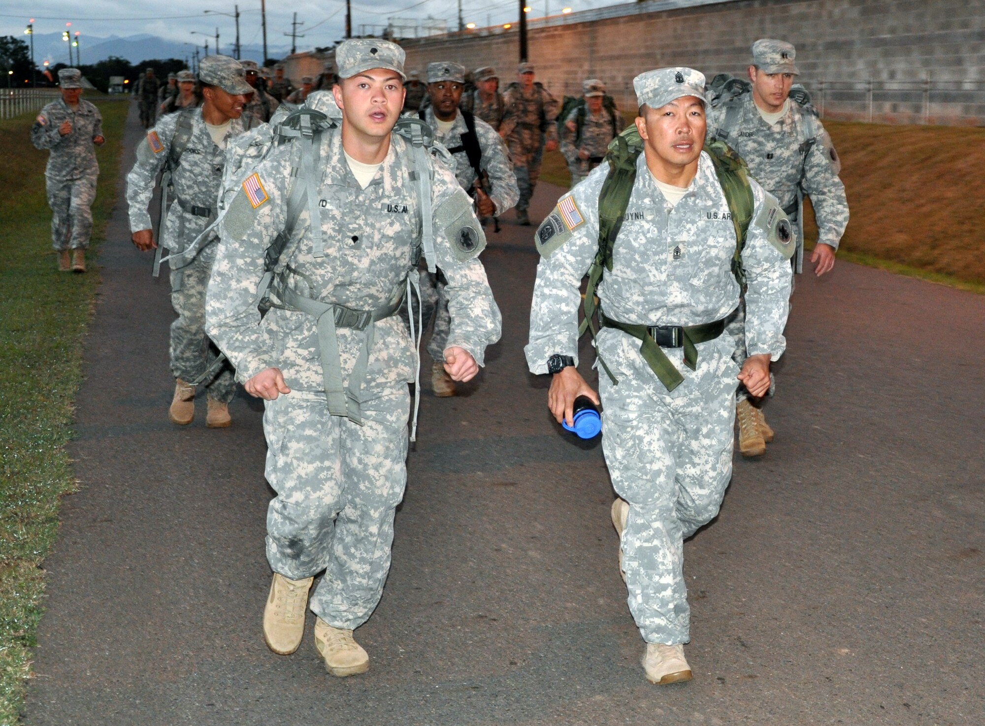 Members of Joint Task Force-Bravo participate in a road march as part of testing for the German Armed Forces Proficiency Badge at Soto Cano Air Base, Honduras, Jan. 16, 2014.  Forty members of Joint Task Force-Bravo qualified to earn the badge after three days of testing.  (U.S. Air Force photo by Capt. Zach Anderson)