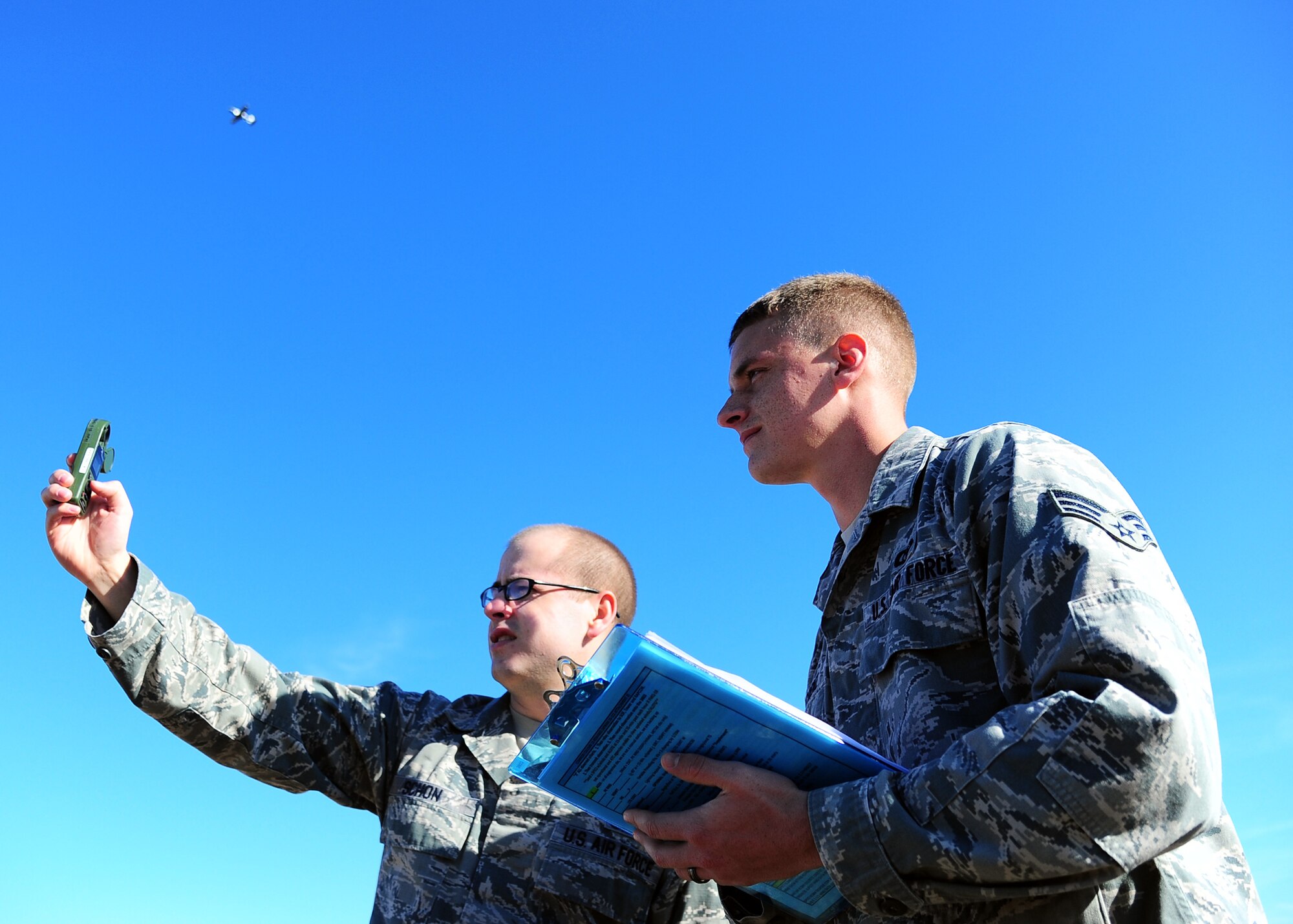 Senior Airman Daniel Schon, 14th Operations Support Squadron, utilizes weather equipment while Senior Airman Ian Lorenz, 14th OSS, records data. The data the Airmen collect is vital to our flying mission at Columbus AFB. (U.S. Air Force Photo/Airman 1st Class Daniel Lile)