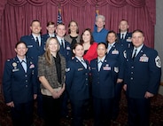 Ninetieth Missile Wing Fourth Quarter Award winners pose for a group photo with Col. Tracey Hayes, 90th MW commander, and Chief Master Sgt. Michael Garrou, 90th MW command chief, in the Trail's End Club Jan. 10, 2013, during and award ceremony. (U.S. Air Force photo by R.J. Oriez)