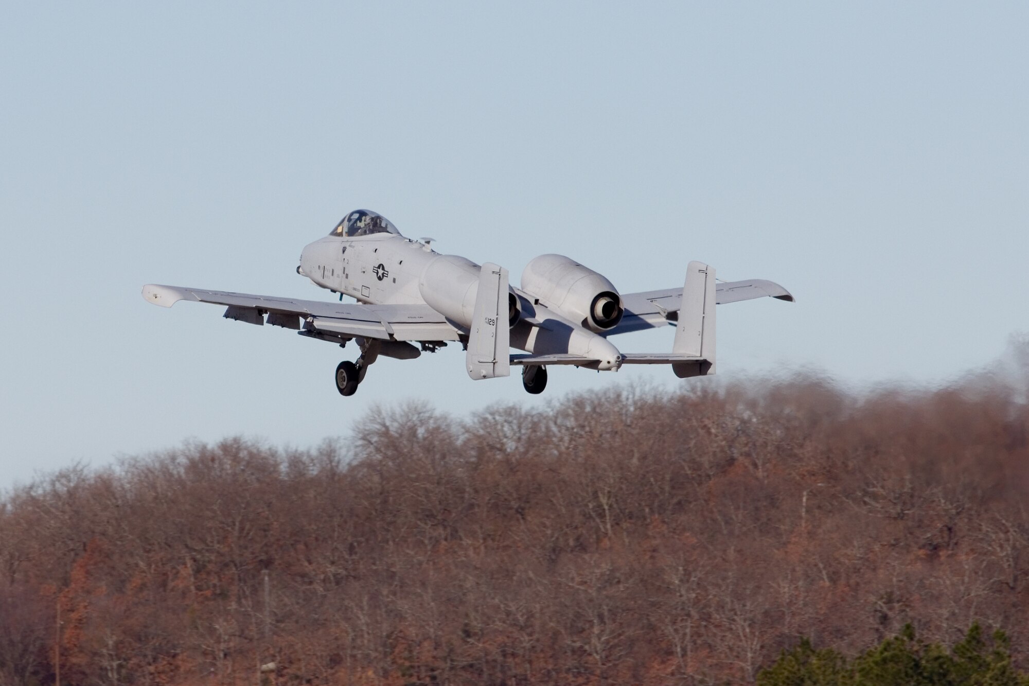 An A-10C Thunderbolt II "Warthog" (Tail No. 0129) takes off from the 188th Fighter Wing for Moody Air Force Base, Ga., Jan. 15, 2014. Tail Nos. 0129 and 0647 were transferred from the 188th’s Ebbing Air National Guard Base, Fort Smith, Ark., as part of the wing’s on-going conversion from a fighter mission to remotely piloted aircraft and Intelligence mission, which will include a space-focused targeting squadron. The 188th now has nine remaining A-10s left on station. The A-10s will join Moody AFB’s 75th Fighter Squadron. (Courtesy photo by Nick Thomas)