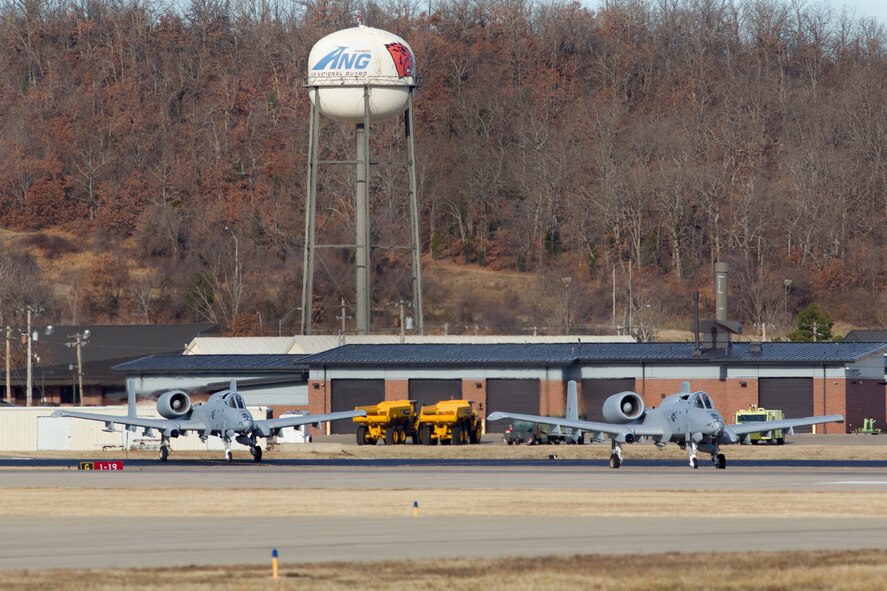 Two A-10C Thunderbolt II "Warthogs" prepare to depart the 188th Fighter Wing for Moody Air Force Base, Ga., Jan. 15, 2014. Tail Nos. 0129 and 0647 were transferred from the 188th’s Ebbing Air National Guard Base, Fort Smith, Ark., as part of the wing’s on-going conversion from a fighter mission to remotely piloted aircraft and Intelligence mission, which will include a space-focused targeting squadron. The 188th now has nine remaining A-10s left on station. The A-10s will join Moody AFB’s 75th Fighter Squadron. (Courtesy photo by Nick Thomas)